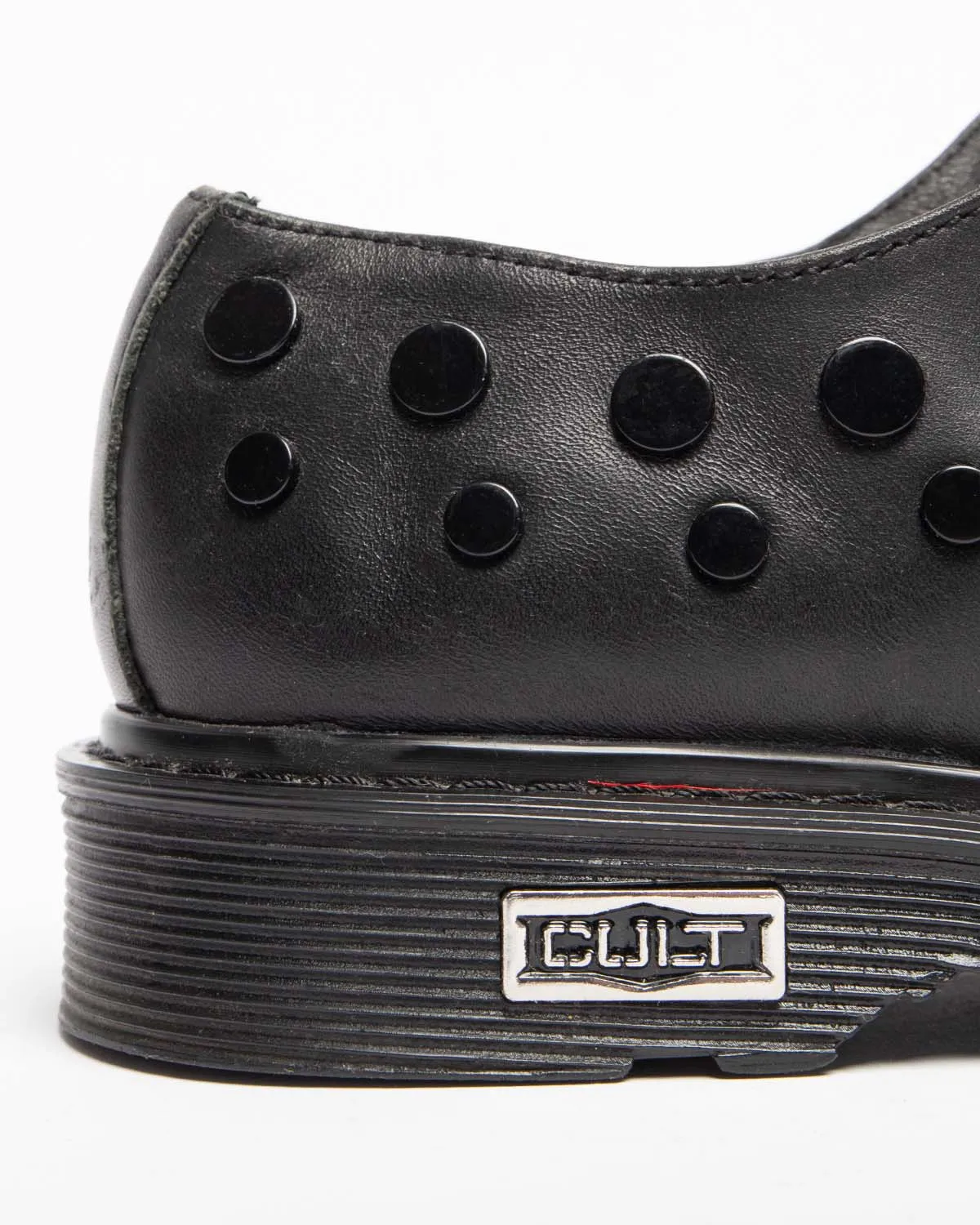 Cult black leather studded slip-on shoes