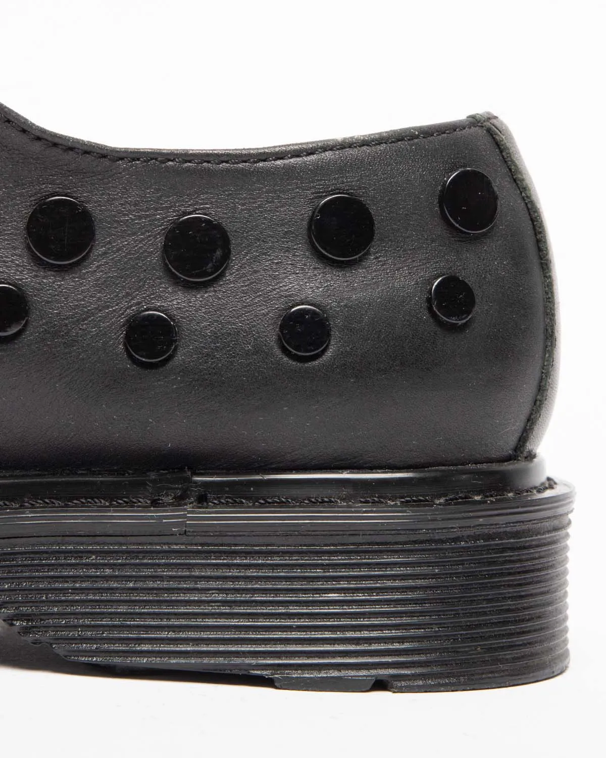 Cult black leather studded slip-on shoes