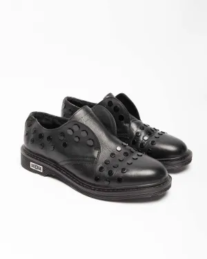 Cult black leather studded slip-on shoes